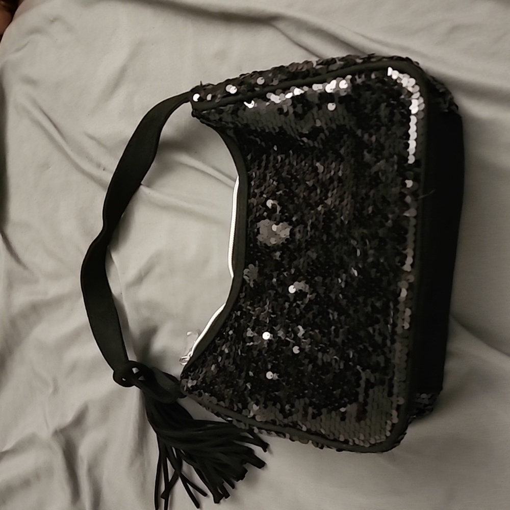 Black sequins bag.